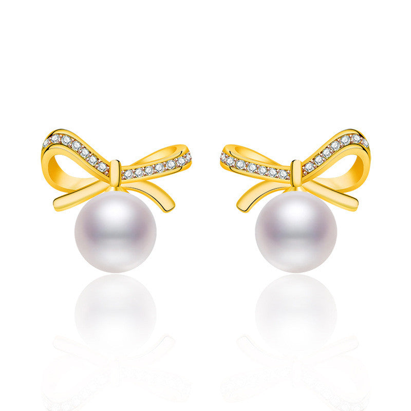 GOLD PLATED AMERICAN DIAMOND STUDDED BOW-TIE SHAPE KOREAN STUD EARRINGS