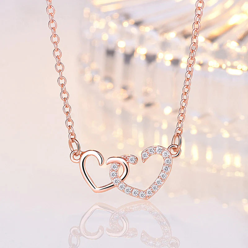 ROSE GOLD PLATED AMERICAN DIAMOND STUDDED DUAL HEART CONTEMPORARY KOREAN PENDANT